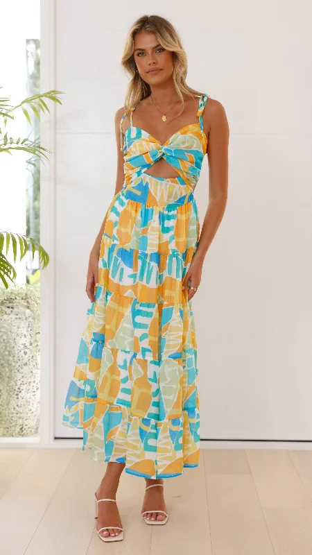 Retro Polka - Dot Maxi Dresses for a Nostalgic FeelYaritza Maxi Dress - Blue / Orange Print Retro Polka - Dot Maxi Dresses for a Nostalgic FeelYaritza Maxi Dress - Blue / Orange Print