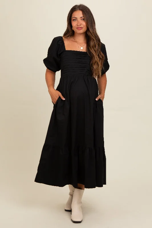 Empire waist midi dress for a flattering and feminine fitBlack Pleated Bodice Puff Sleeve Maternity Midi Dress Empire waist midi dress for a flattering and feminine fitBlack Pleated Bodice Puff Sleeve Maternity Midi Dress