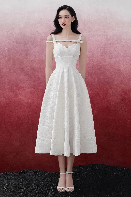 Midi dress for a photoshoot to create a stylish and memorable lookIsabel Fit and Flare Sleeveless Tweed Midi Dress Midi dress for a photoshoot to create a stylish and memorable lookIsabel Fit and Flare Sleeveless Tweed Midi Dress
