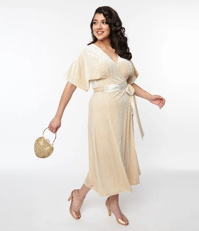 Asymmetric hem midi dress for a unique and fashionable styleUnique Vintage 1970s Ivory Peacock Velvet Wrap Midi Dress