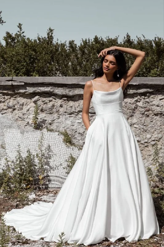 Contemporary geometric - print wedding dressA-line Spaghetti Straps Wedding Gown with Pockets Contemporary geometric - print wedding dressA-line Spaghetti Straps Wedding Gown with Pockets