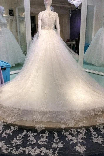 Pearl - studded wedding dress for a refined lookBeaded Lace A-Line Long Sleeve Dress With Illusion Back Pearl - studded wedding dress for a refined lookBeaded Lace A-Line Long Sleeve Dress With Illusion Back