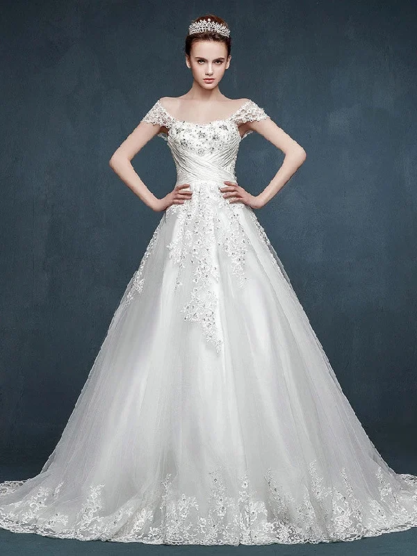 Cape - backed wedding dress for a dramatic entranceFairy Tale Lace A-line Wedding Dress with Cap Sleeves Cape - backed wedding dress for a dramatic entranceFairy Tale Lace A-line Wedding Dress with Cap Sleeves
