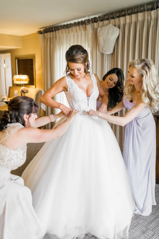 French - style wedding dress with lace detailsPlunging V-neckline Lace Wedding Dress with Detachable Overskirt French - style wedding dress with lace detailsPlunging V-neckline Lace Wedding Dress with Detachable Overskirt