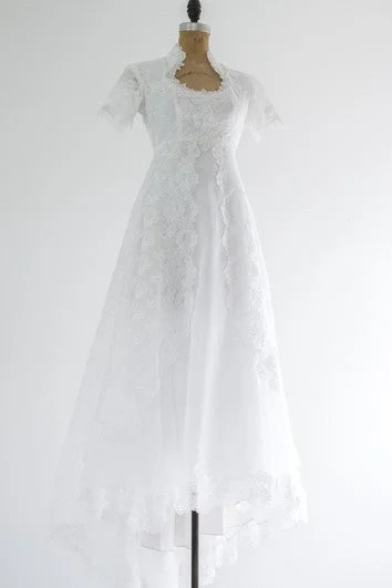 French - style wedding dress with lace detailsQueen Anne Neckline Short Sleeve A-Line Lace Dress With Beadings French - style wedding dress with lace detailsQueen Anne Neckline Short Sleeve A-Line Lace Dress With Beadings